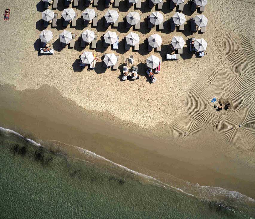 Aerial view of Trata at Agios Georgios beach in Naxos